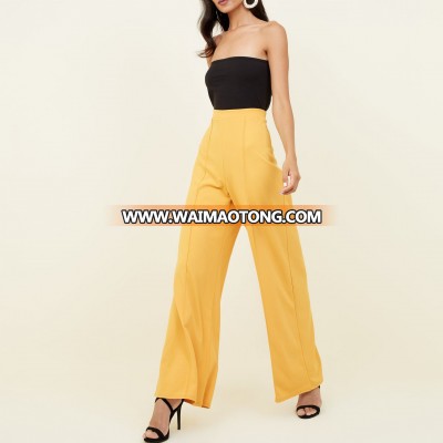 Women wide leg formal work trousers in yellow color